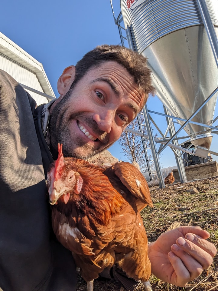 Aaron with one of our friendly chickens